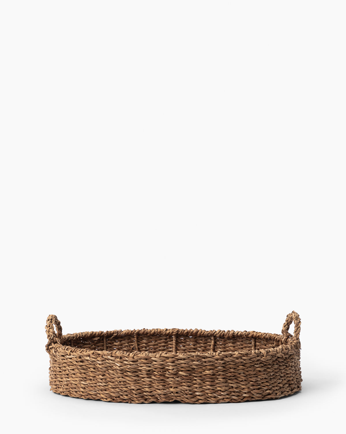 https://cdn.shopify.com/s/files/1/1496/0124/files/SeagrassOvalTray-MDCR2857-NAT-M-MAIN-T.jpg?v=1712331097