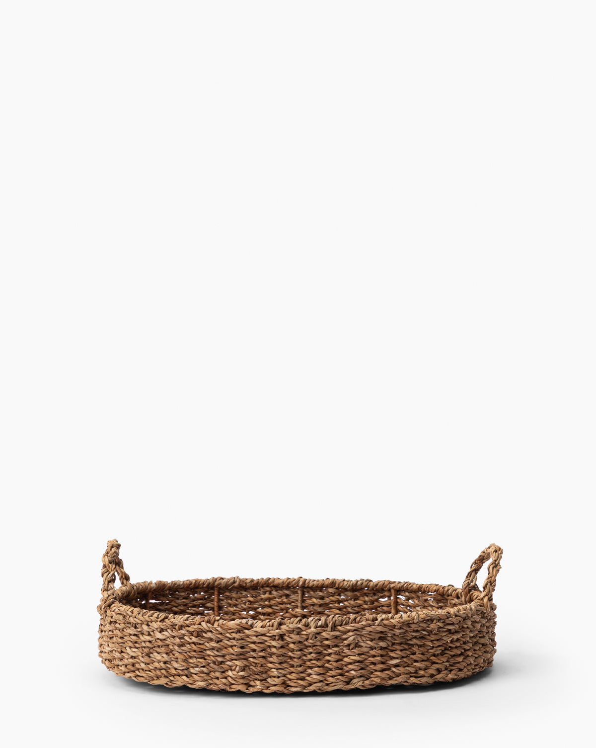 https://cdn.shopify.com/s/files/1/1496/0124/files/SeagrassOvalTray-MDCR2857-NAT-S-MAIN-T.jpg?v=1712331097